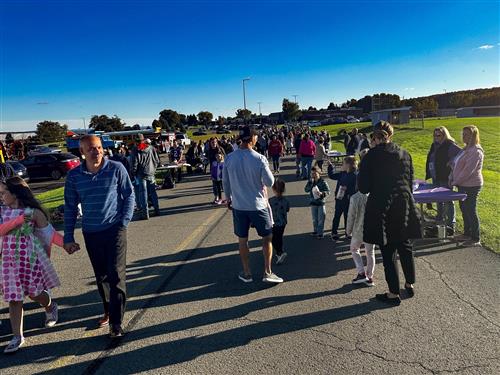  Outside Open House attendees mill about the parking lots at PVCS 